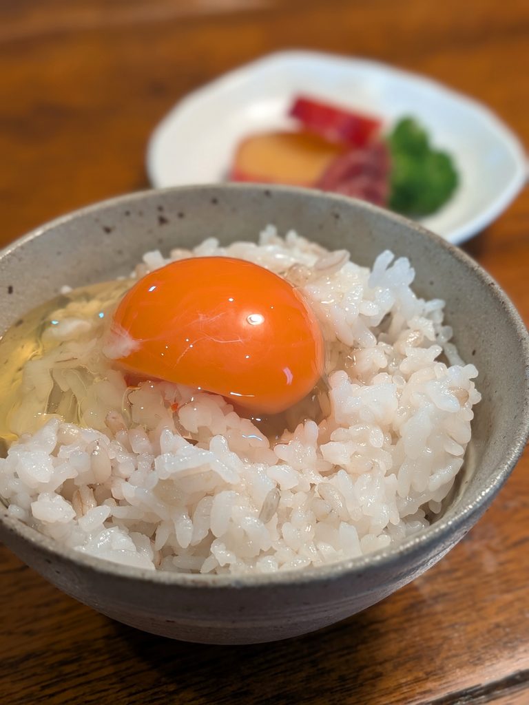 Tamago Kake Gohan (TKG) at my home. Just hot rice and a raw egg, with a little soy sauce.